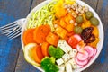 Vegan Buddha bowl - zucchini pasta, sweet potatoes, tofu with vegetables. Royalty Free Stock Photo