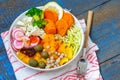 Vegan Buddha bowl - zucchini pasta, sweet potatoes, tofu with vegetables. Royalty Free Stock Photo