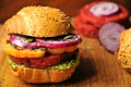 Vegan burger with beans and red beet on a wooden background Royalty Free Stock Photo