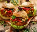 Vegan burgers, Pumpkin burgers with the addition of grilled peppers, lettuce, fresh herbs and capers Royalty Free Stock Photo