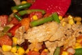 Vegan Chicken Vegetable Bean Stir Fry in Wok with Spatula