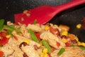 Vegan Chicken Vegetable Bean Stir Fry in Wok with Spatula