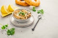 Vegan chickpea hummus spread with lemon and bagel