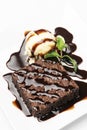 Vegan chocolate brownie dessert with dairy-free vanilla ice cream Royalty Free Stock Photo