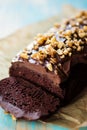 Vegan chocolate cake with caramelized walnuts Royalty Free Stock Photo