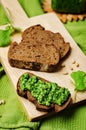 Vegan cilantro pine nuts pesto on a wooden background Royalty Free Stock Photo