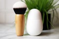 vegan cleansing brush next to mattifying lotion Royalty Free Stock Photo