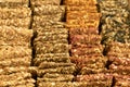 Vegan crackers breadcrisp made with sesame, flax, sunflower, pumpkin and hemp seeds. Raw food background