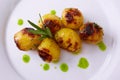 Vegan cuisine. Grilled baby potatoes with rosemary. Shallow dof.