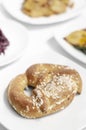 Vegan dairy-free organic german pretzel bread on white table