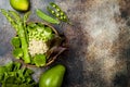 Vegan, detox green Buddha bowl recipe with quinoa, cucumber, broccoli, asparagus and sweet peas. Royalty Free Stock Photo