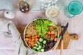 Vegan dish, quinoa salad with baked and fresh vegetables