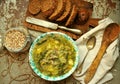 Vegan dish: quinoa soup with organic cabbage and potatoes