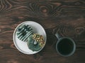 Vegan donuts topped spirulina glaze and tea Royalty Free Stock Photo