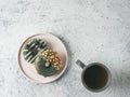 Vegan donuts topped spirulina glaze and tea Royalty Free Stock Photo