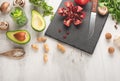 Vegan food, detox, avocado, fruit, green beans, broccoli, nuts and mushrooms. Diet and healthy food, vitamins and sports. Flat-lay Royalty Free Stock Photo