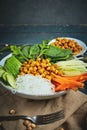 Vegan food, fried chickpeas, rice noodles with wegetables