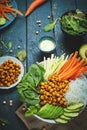 Vegan food, fried chickpeas, rice noodles with wegetables