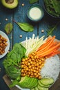 Vegan food, fried chickpeas, rice noodles with wegetables