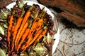 Vegan food with grilled carrots and bitter salad