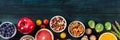 Vegan food panorama, top shot with a place for text. Fruit and vegetables, legumes, mushrooms, nuts, a flat lay header