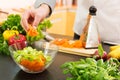 Vegan food - preparing vegetable salad with grated carrots Royalty Free Stock Photo