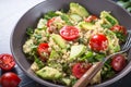 Quinoa salad with spinach, avocado and tomatoes