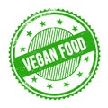 VEGAN FOOD text written on green grungy round stamp