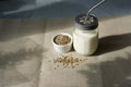 Vegan fresh milk from hemp seeds in a glass jar, clean eating, non-dairy milk. Backround from linen Royalty Free Stock Photo