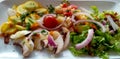 Vegan fresh salad with mushrooms and onions