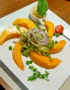 Vegan fruit salad orange and green