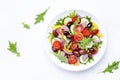 Vegan greek salad with kalamata olives, cherry tomato, yellow paprika, cucumber and red onion, healthy mediterranean diet food,