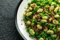 Vegan Green broad beans and quinoa salad with sweet peas and mint. Healthy food. Royalty Free Stock Photo