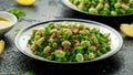 Vegan Green broad beans and quinoa salad with sweet peas and mint. Healthy food. Royalty Free Stock Photo