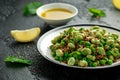 Vegan Green broad beans and quinoa salad with sweet peas and mint. Healthy food. Royalty Free Stock Photo