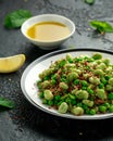 Vegan Green broad beans and quinoa salad with sweet peas and mint. Healthy food. Royalty Free Stock Photo