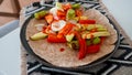 Vegan grilled vegetable wrap on gray plate Royalty Free Stock Photo