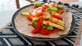 Vegan grilled vegetable wrap on gray plate Royalty Free Stock Photo