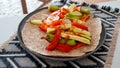 Vegan grilled vegetable wrap on gray plate Royalty Free Stock Photo