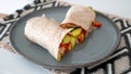 Vegan grilled vegetable wrap on gray plate Royalty Free Stock Photo