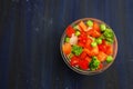 Vegan Healthy Food concept. Bowl with Vegetables. Frozen Colorful Vegetables. Brocolli, Carrots, Peas, Pepper. Top View.