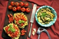 Vegan healthy food with grilled zucchini and fresh tomato