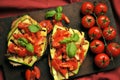 Vegan healthy food with grilled zucchini and fresh tomato