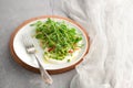 Vegan healthy salad made of microgreen sprouts peas