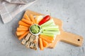 Vegan healthy snacks: guacamole, carrots, celery Royalty Free Stock Photo