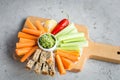 Vegan healthy snacks: guacamole, carrots, celery Royalty Free Stock Photo