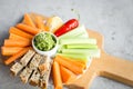 Vegan healthy snacks: guacamole, carrots, celery Royalty Free Stock Photo