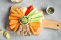 Vegan healthy snacks: guacamole, carrots, celery Royalty Free Stock Photo