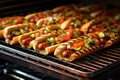 vegan hot dogs sizzling on a charcoal grill Royalty Free Stock Photo