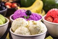 vegan ice cream made with organic fruits, with tropical fruits in the background, flavors of strawberry, banana, jabuticaba and Royalty Free Stock Photo